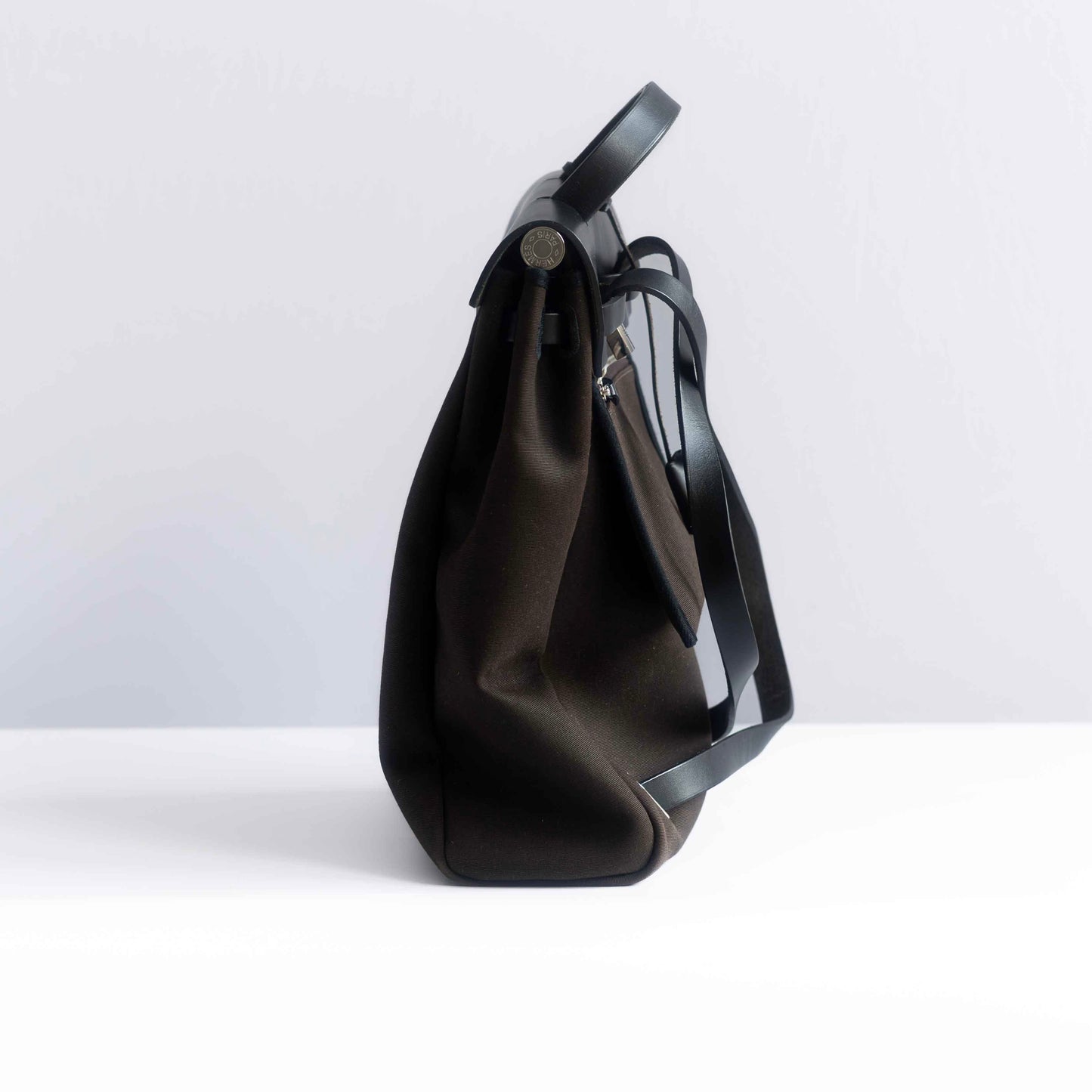 HERMÈS - BACKPACK HERBAG BROWN CANVAS AND BLACK LEATHER SILVER HARDWARE