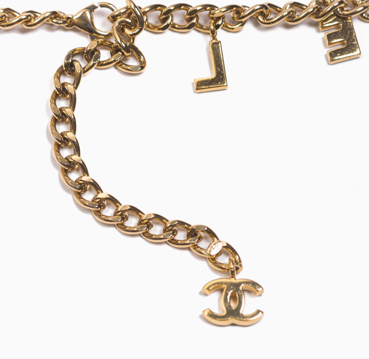 CHANEL - BELT GOLD-TONE CHAIN WITH CHANEL LETTERING CHARM