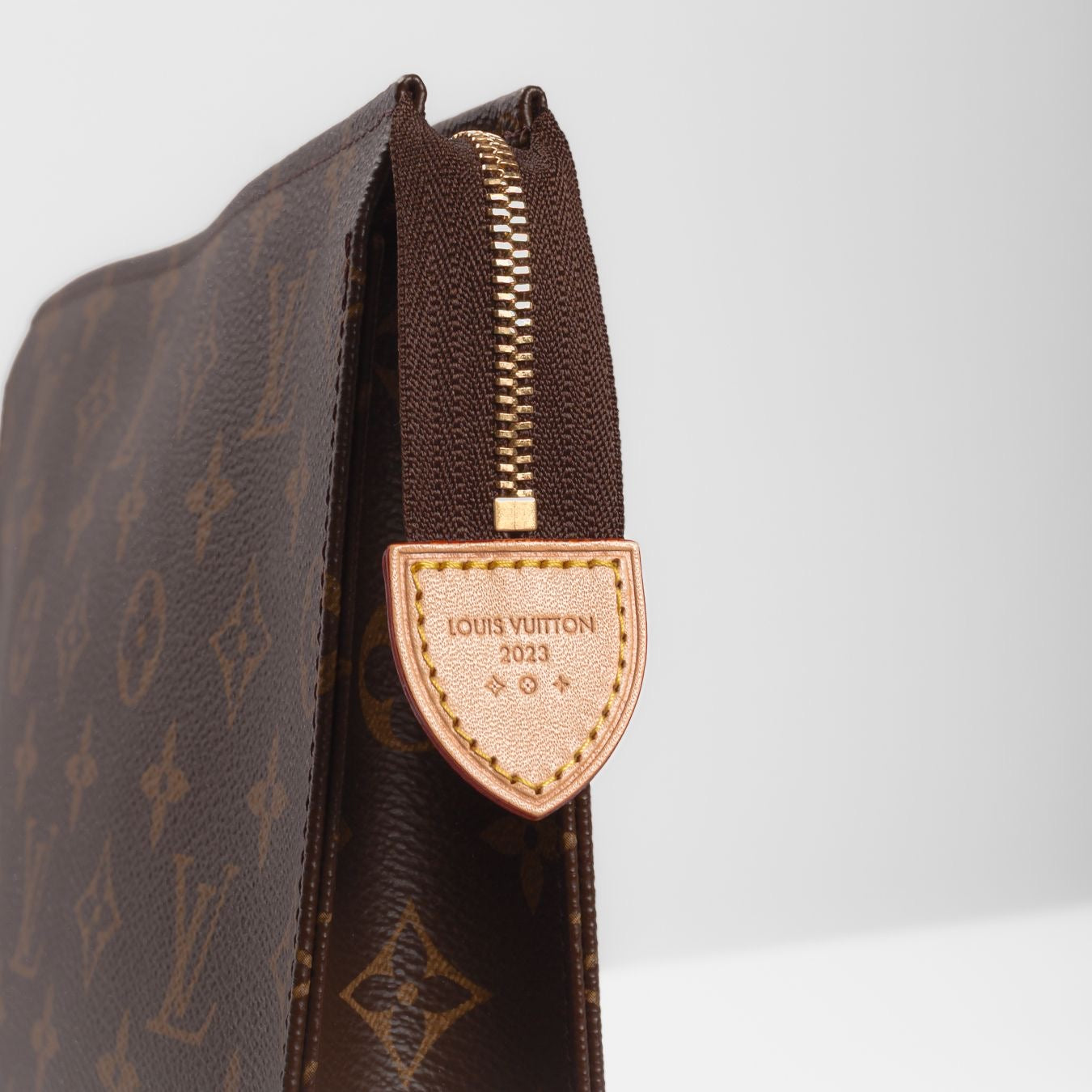 LOUIS VUITTON - MONOGRAM LEATHER POUCH 25