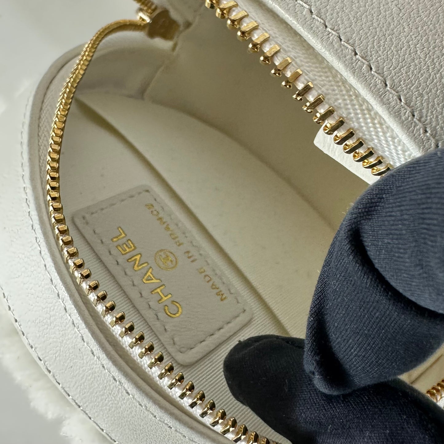 CHANEL - Quilted Round bag white shearling Coco Neige