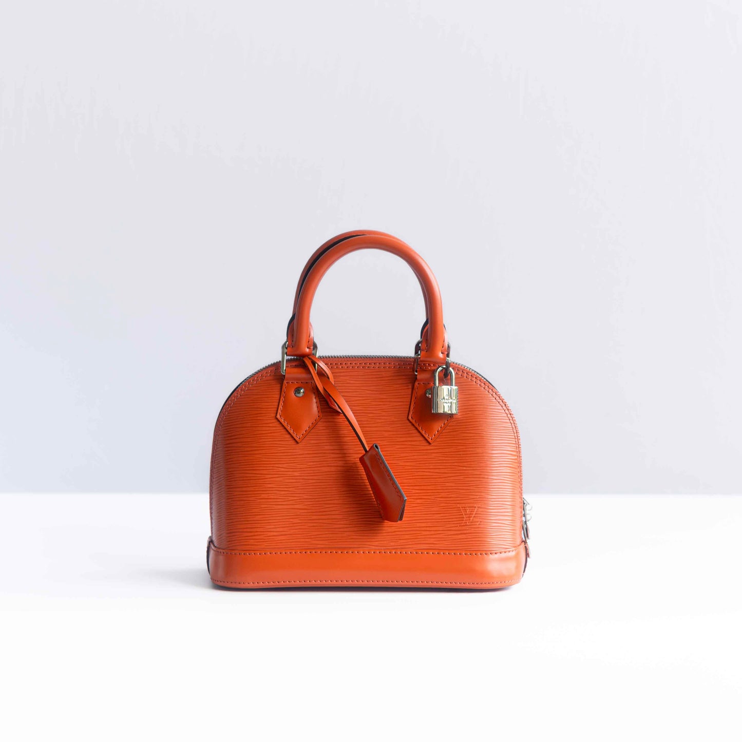LOUIS VUITTON - BAG ALMA BB ORANGE LEATHER WITH STRAP