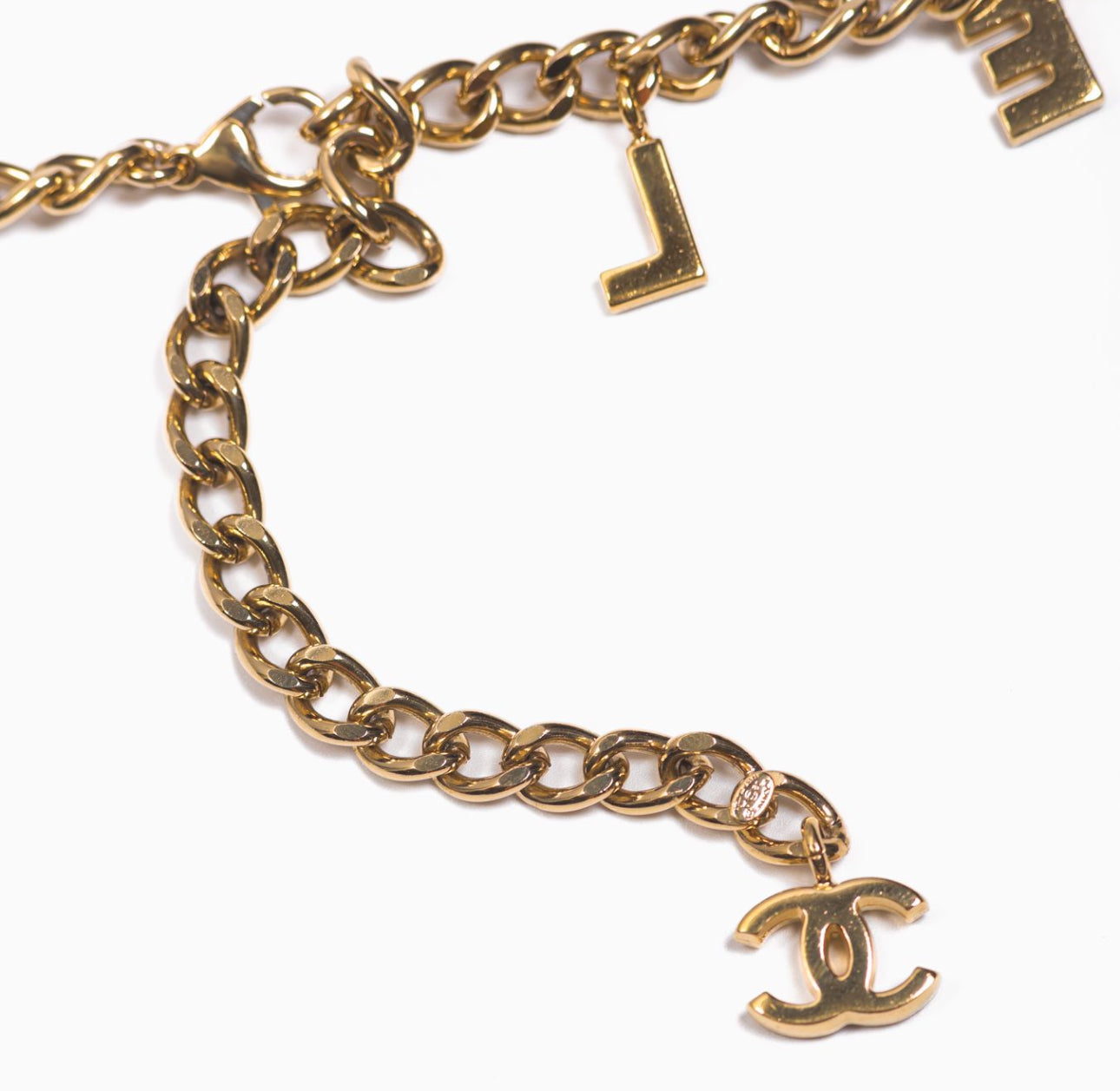 CHANEL - BELT GOLD-TONE CHAIN WITH CHANEL LETTERING CHARM