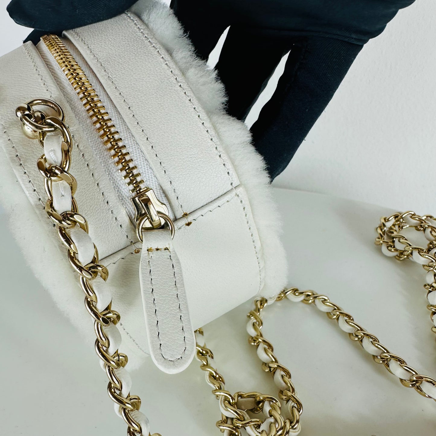CHANEL - Quilted Round bag white shearling Coco Neige