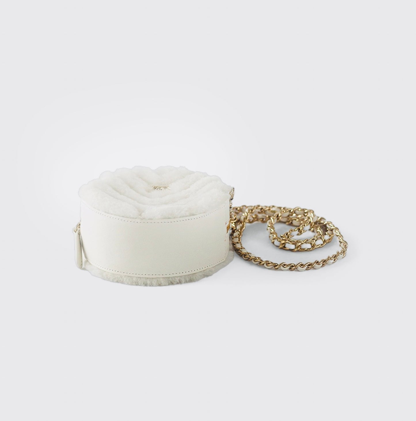 CHANEL - QUILTED ROUND BAG WHITE SHEARLING COCO NEIGE