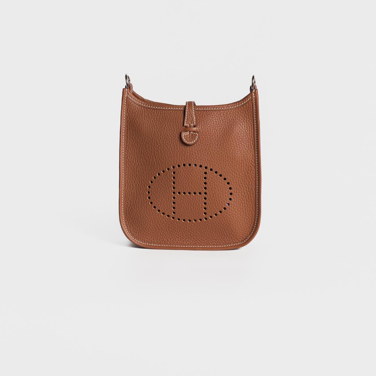 HERMÈS - *BRAND NEW* MINI EVELINE TAURILLON CLEMENCE GOLD