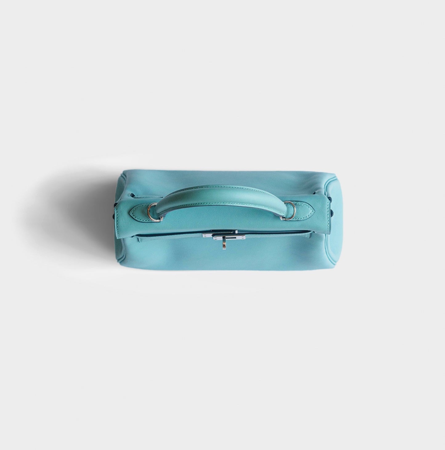 HERMÈS -  KELLY 25 BAG IN LIGHT BLUE SWIFT LEATHER WITH PALLADIUM HARDWARE