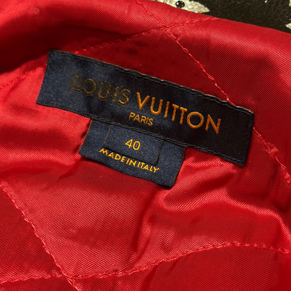 LOUIS VUITTON – BIKER JACKET BLACK MONOGRAM PRINTED LEATHER WITH RED LINING SIZE 40 FR