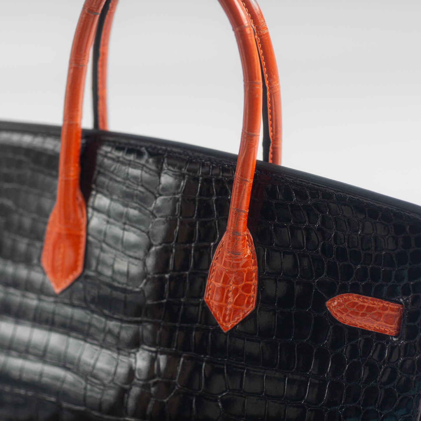 HERMÈS - HANDBAG BIRKIN 35 LIMITED EDITION BLACK & ORANGE SHINY POROSUS CROCODILE