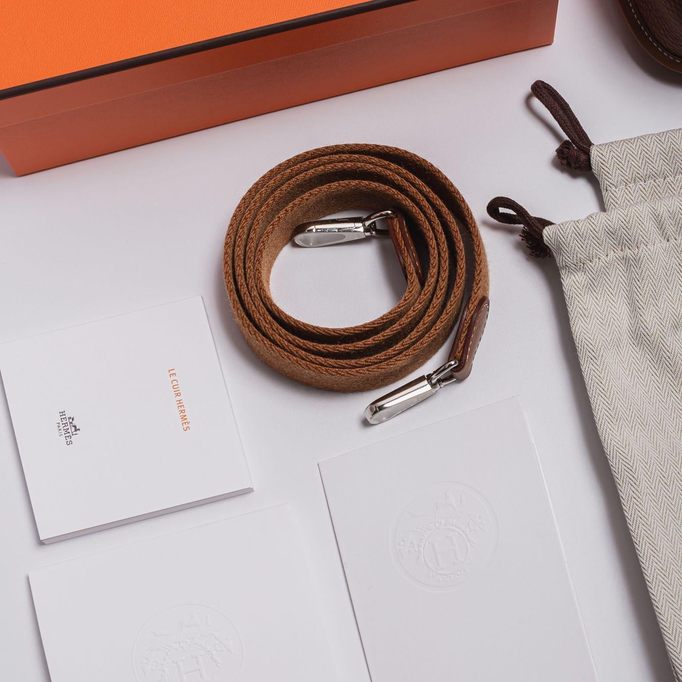 HERMÈS - *BRAND NEW* MINI EVELINE TAURILLON CLEMENCE GOLD