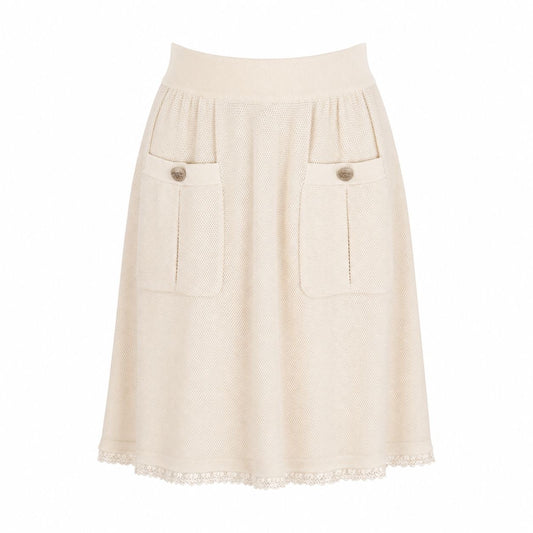 CHANEL - SKIRT ECRU COTTON QITH FRONT POCKETS AND LOGO BUTTONS SIZE 38 FR