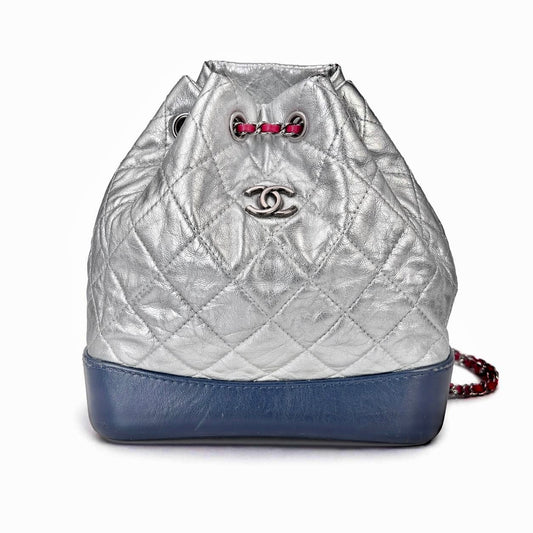 CHANEL - BACKPACK BAG GABRIELLE SILVER WITH NAVY LEATHER BASE