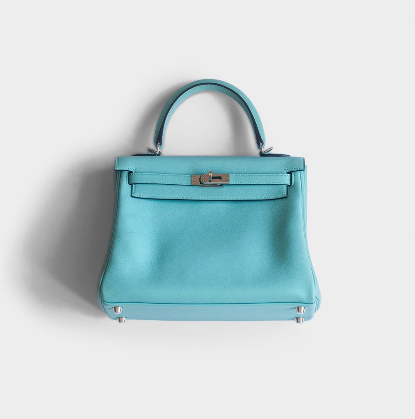 HERMÈS -  KELLY 25 BAG IN LIGHT BLUE SWIFT LEATHER WITH PALLADIUM HARDWARE