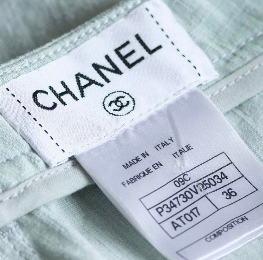 CHANEL - JEANS LIGHT BLUE STRETCH FLARED WITH LOGO BUTTON SIZE 36 FR