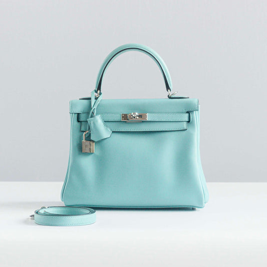 HERMÈS -  KELLY 25 BAG IN BLUE ATOLL SWIFT LEATHER WITH PALLADIUM HARDWARE