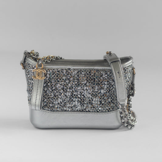 CHANEL - GABRIELLE HANDBAG SILVER LEATHER CANVAS & SEQUINS
SMALL