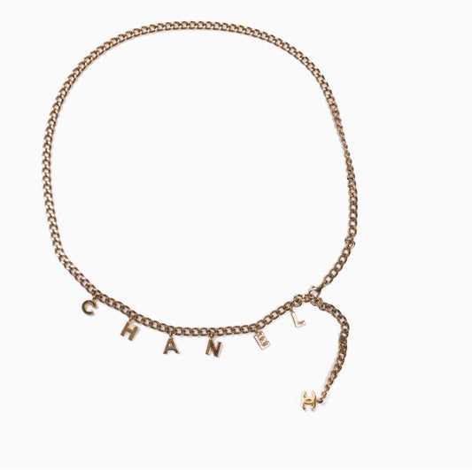 CHANEL - BELT GOLD-TONE CHAIN WITH CHANEL LETTERING CHARM