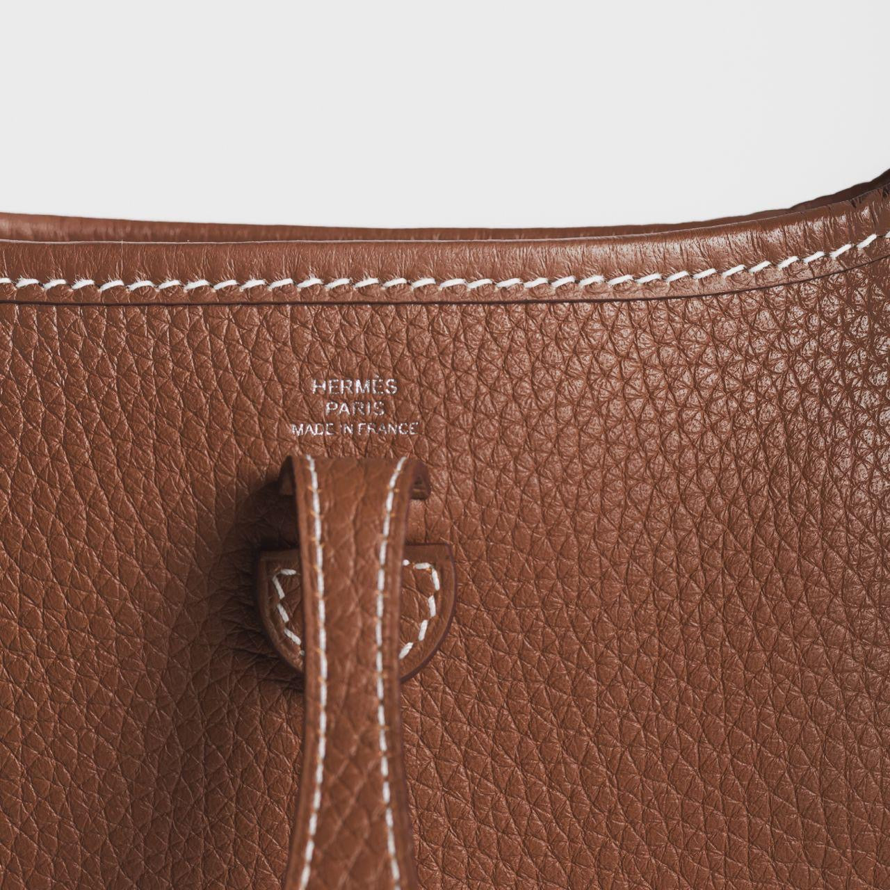 HERMÈS - *BRAND NEW* MINI EVELINE TAURILLON CLEMENCE GOLD