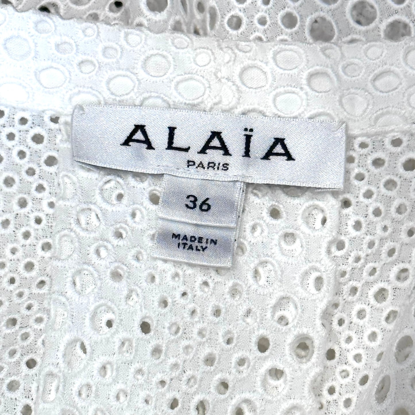 ALAÏA - DRESS MIDI CIRCLE EYELET WHITE WITH BLACK BELT SIZE 36 FR