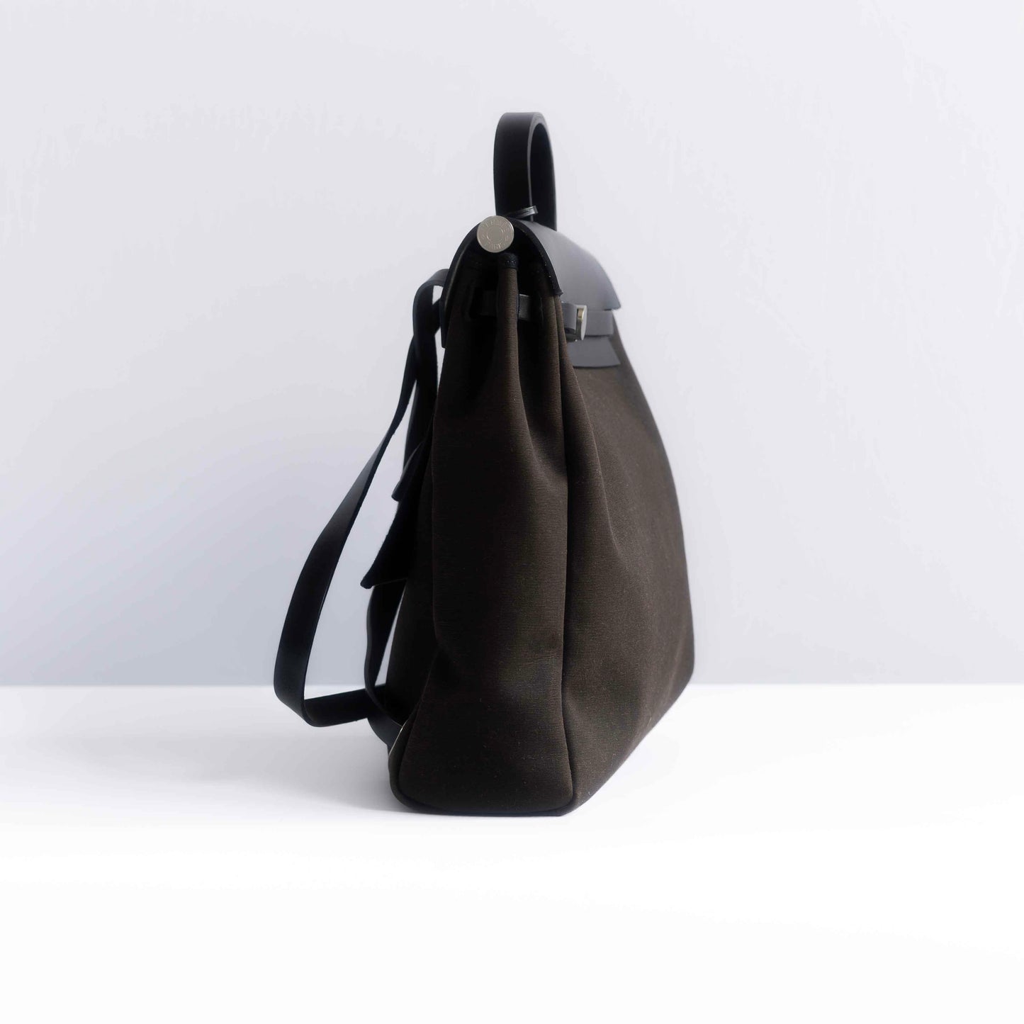 HERMÈS - BACKPACK HERBAG BROWN CANVAS AND BLACK LEATHER SILVER HARDWARE