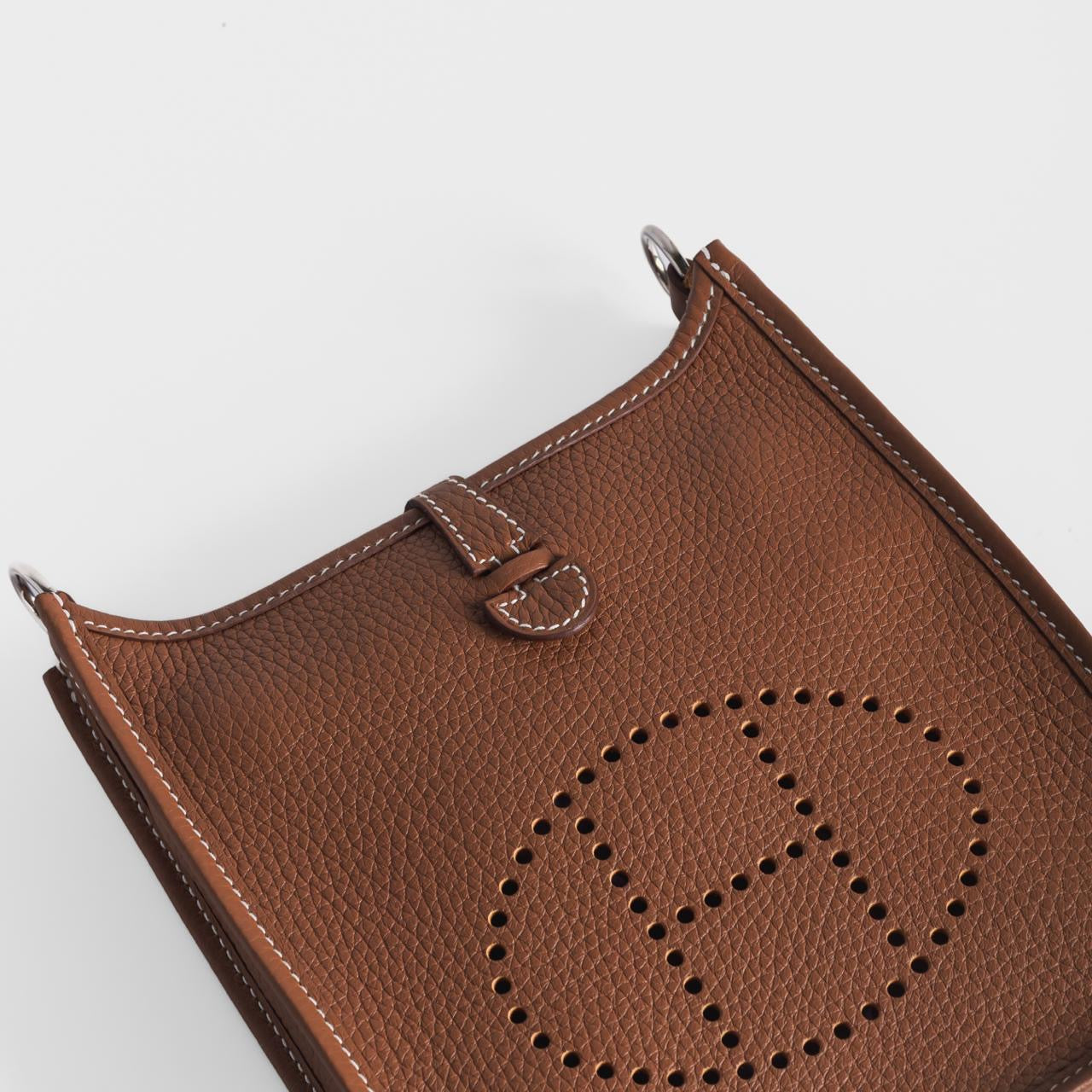 HERMÈS - *BRAND NEW* MINI EVELINE TAURILLON CLEMENCE GOLD