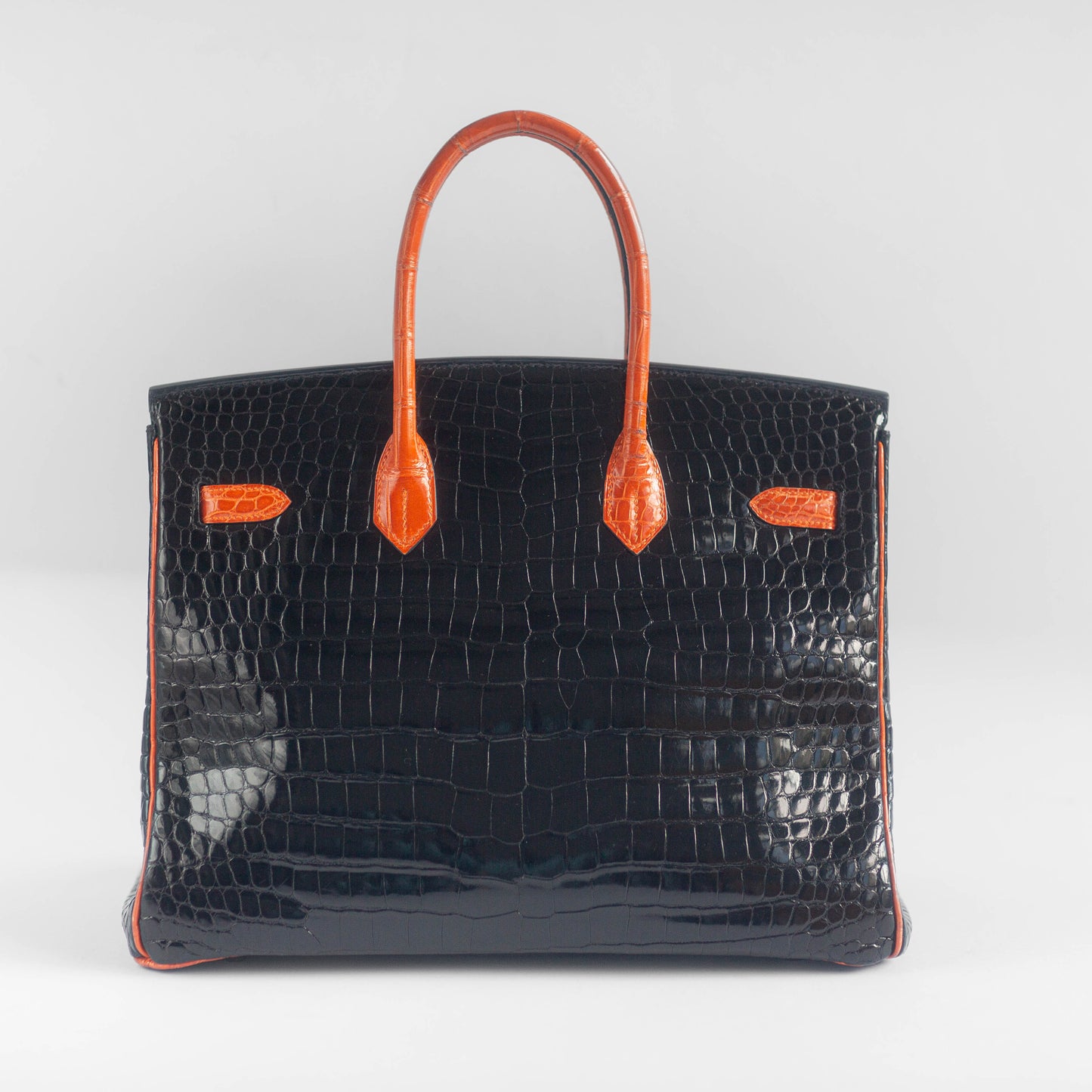 HERMÈS - HANDBAG BIRKIN 35 LIMITED EDITION BLACK & ORANGE SHINY POROSUS CROCODILE