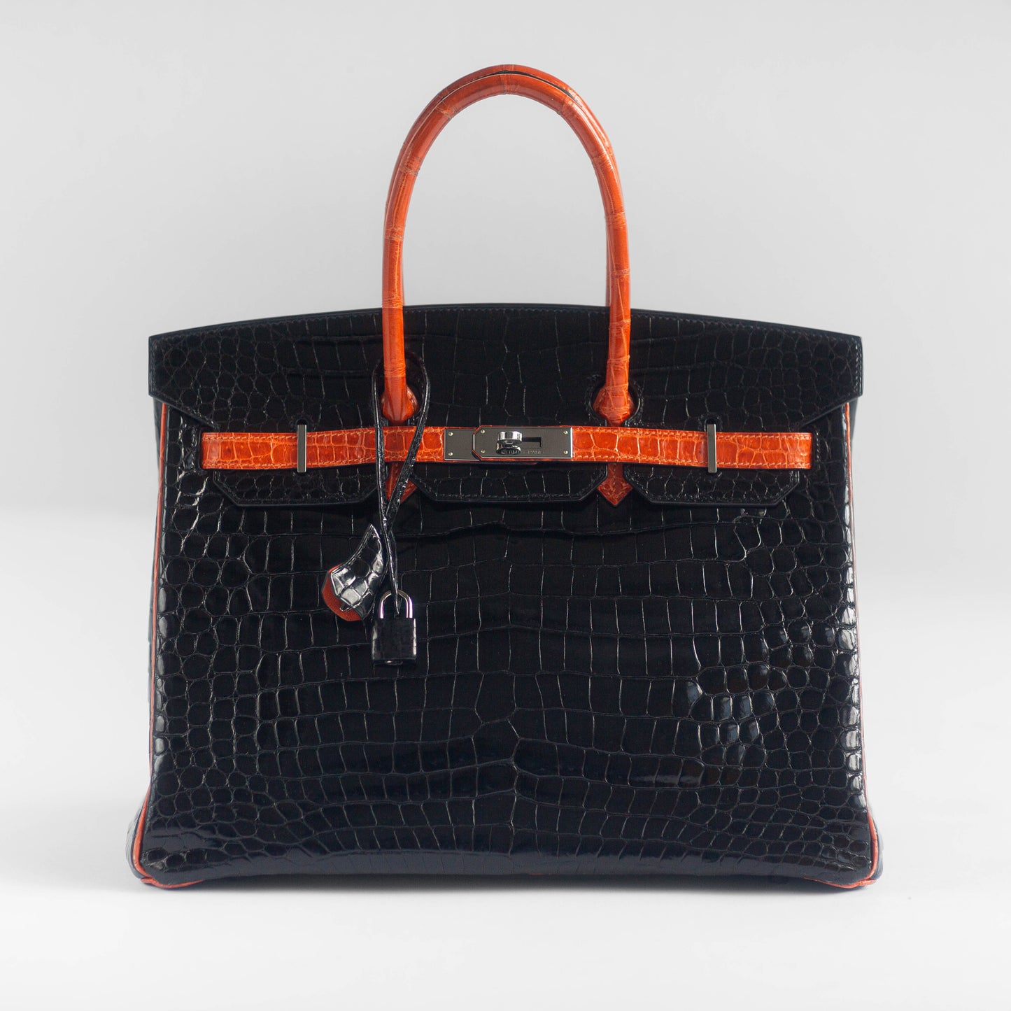 HERMÈS - HANDBAG BIRKIN 35 LIMITED EDITION BLACK & ORANGE SHINY POROSUS CROCODILE