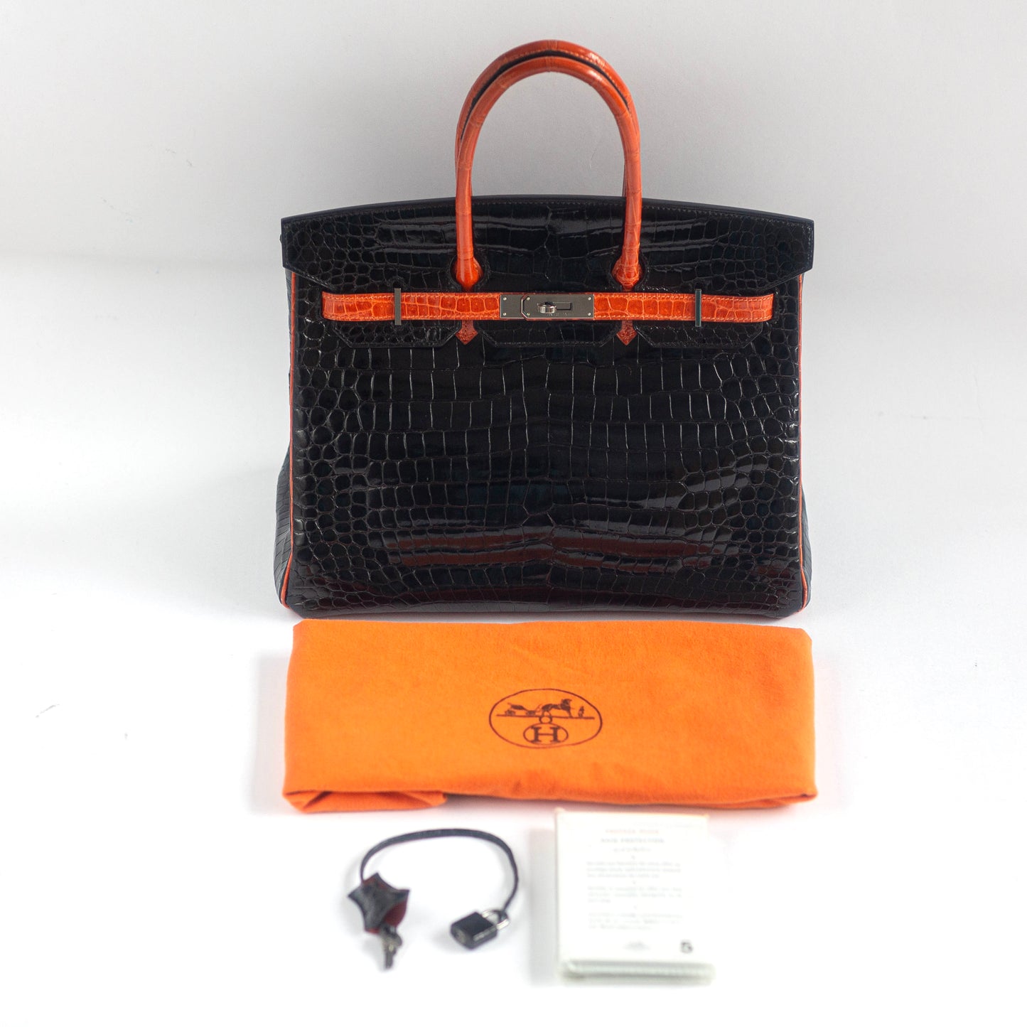 HERMÈS - HANDBAG BIRKIN 35 LIMITED EDITION BLACK & ORANGE SHINY POROSUS CROCODILE