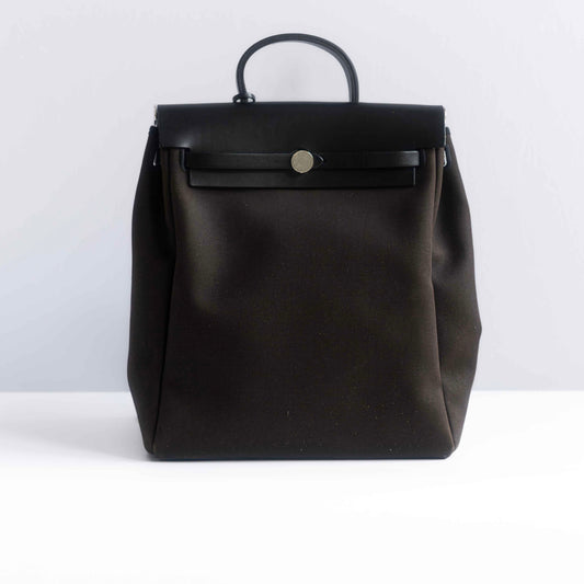 HERMÈS - BACKPACK HERBAG BROWN CANVAS AND BLACK LEATHER SILVER HARDWARE