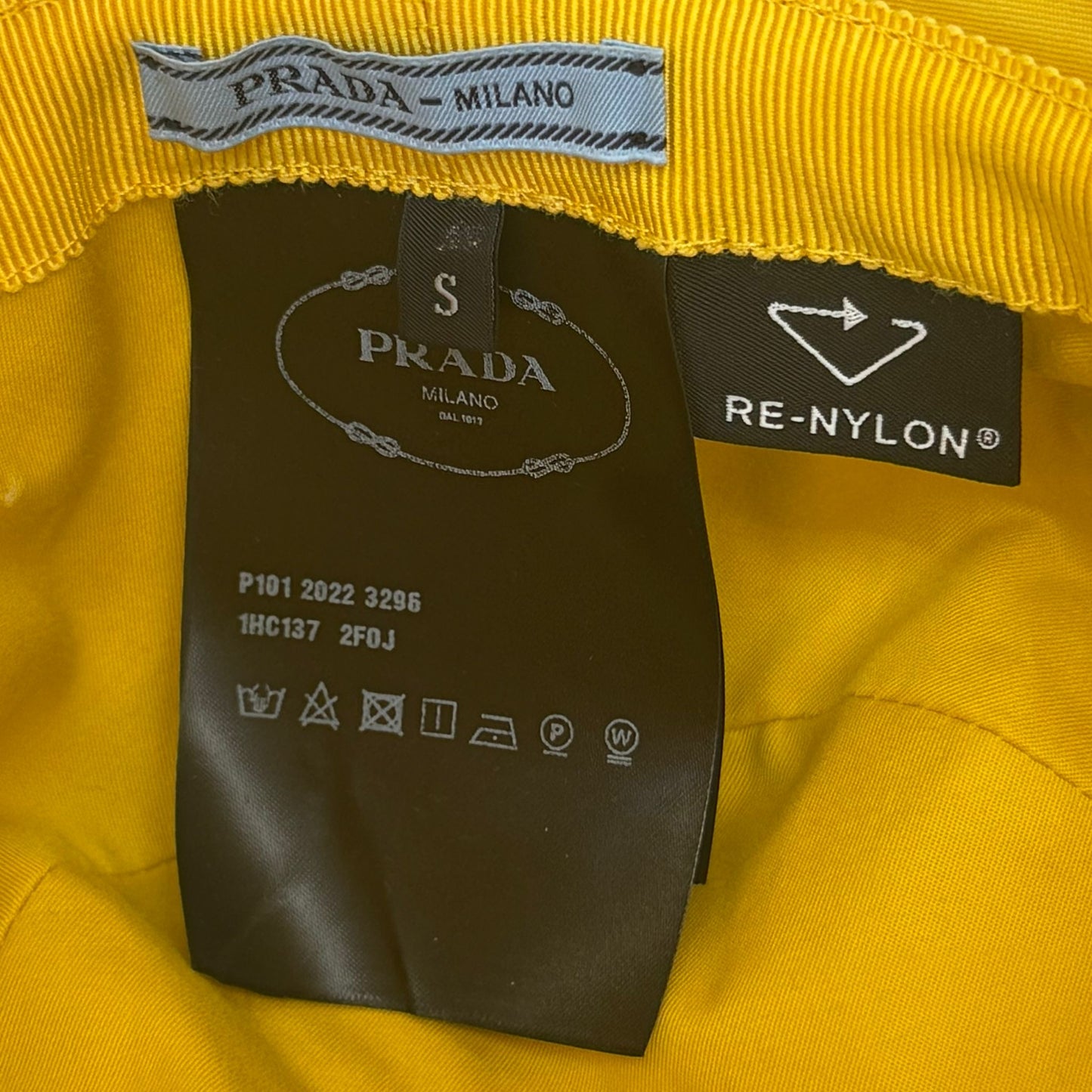 PRADA - *NEVER WORN* HAT RE-NYLON STRIPED BUCKET IN YELLOW SIZE S
