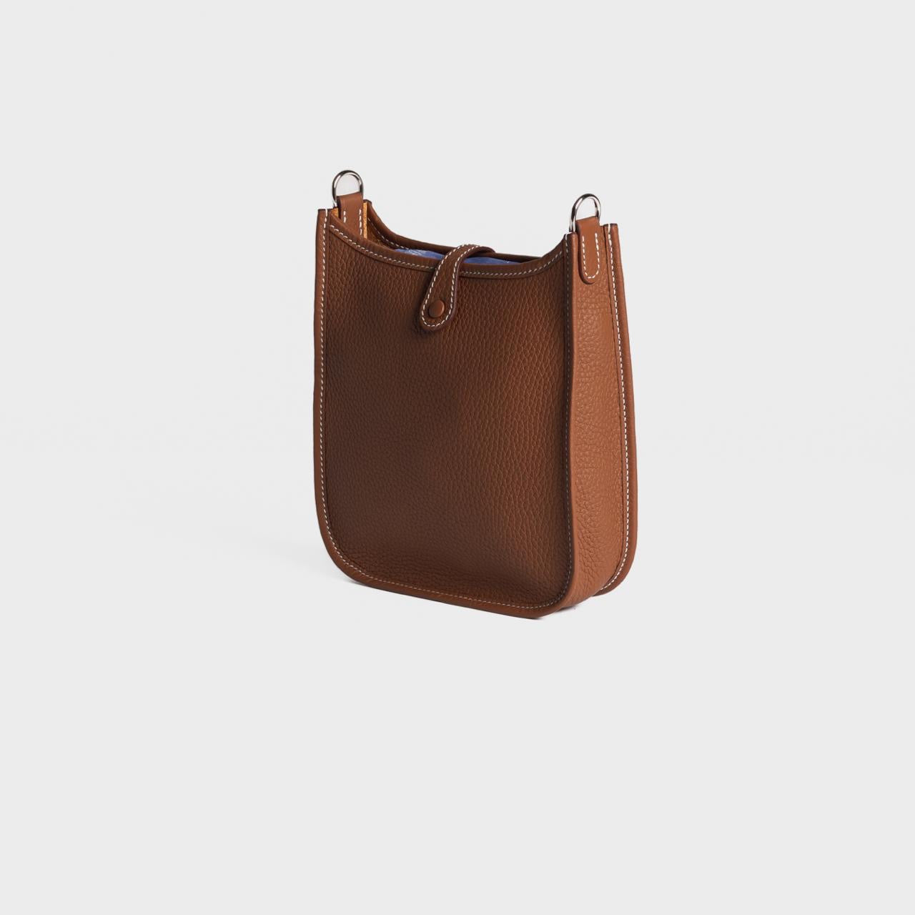 HERMÈS - *BRAND NEW* MINI EVELINE TAURILLON CLEMENCE GOLD