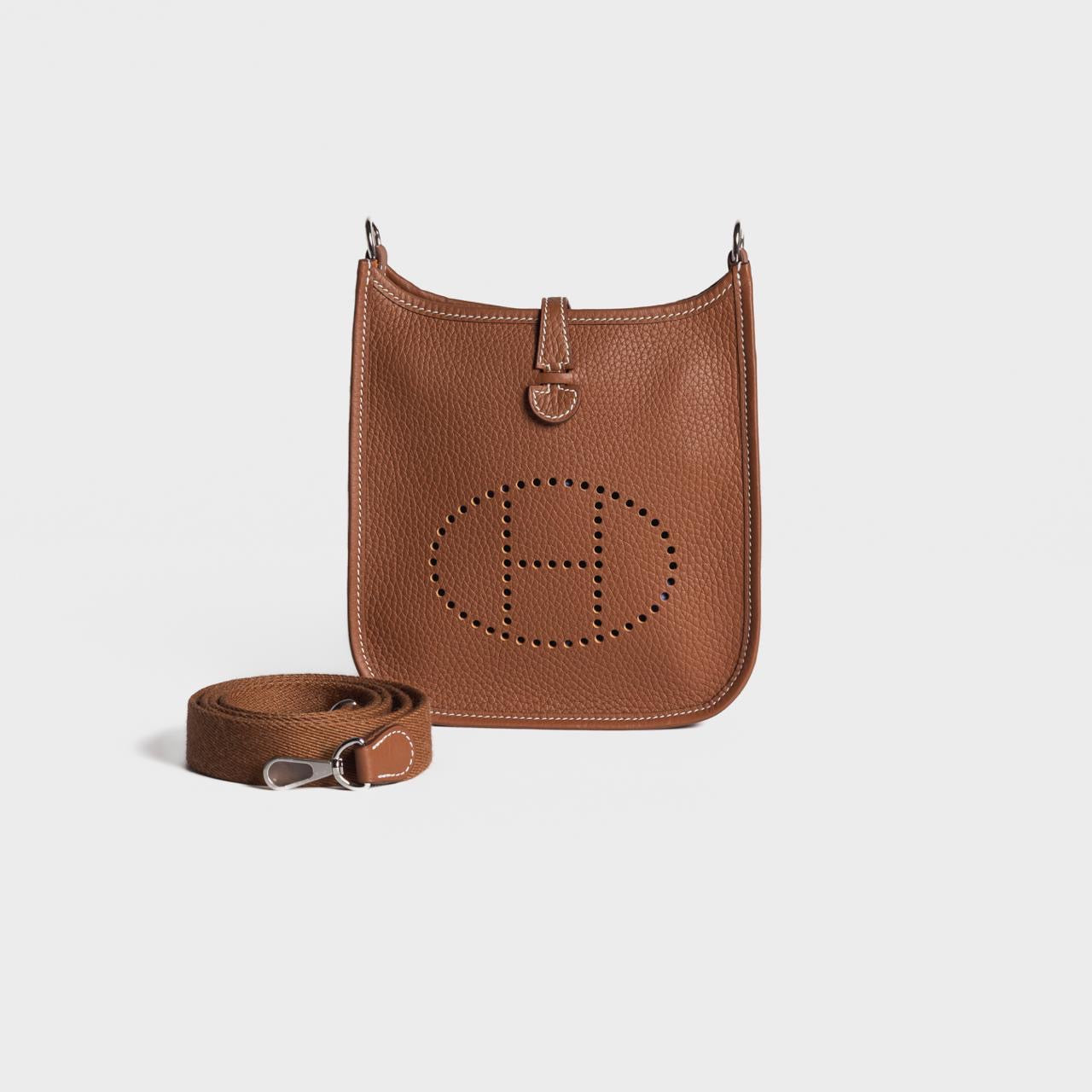 HERMÈS - *BRAND NEW* MINI EVELINE TAURILLON CLEMENCE GOLD