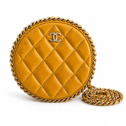 CHANEL - BAG ROUND OCHRE YELLOW WITH CHAIN